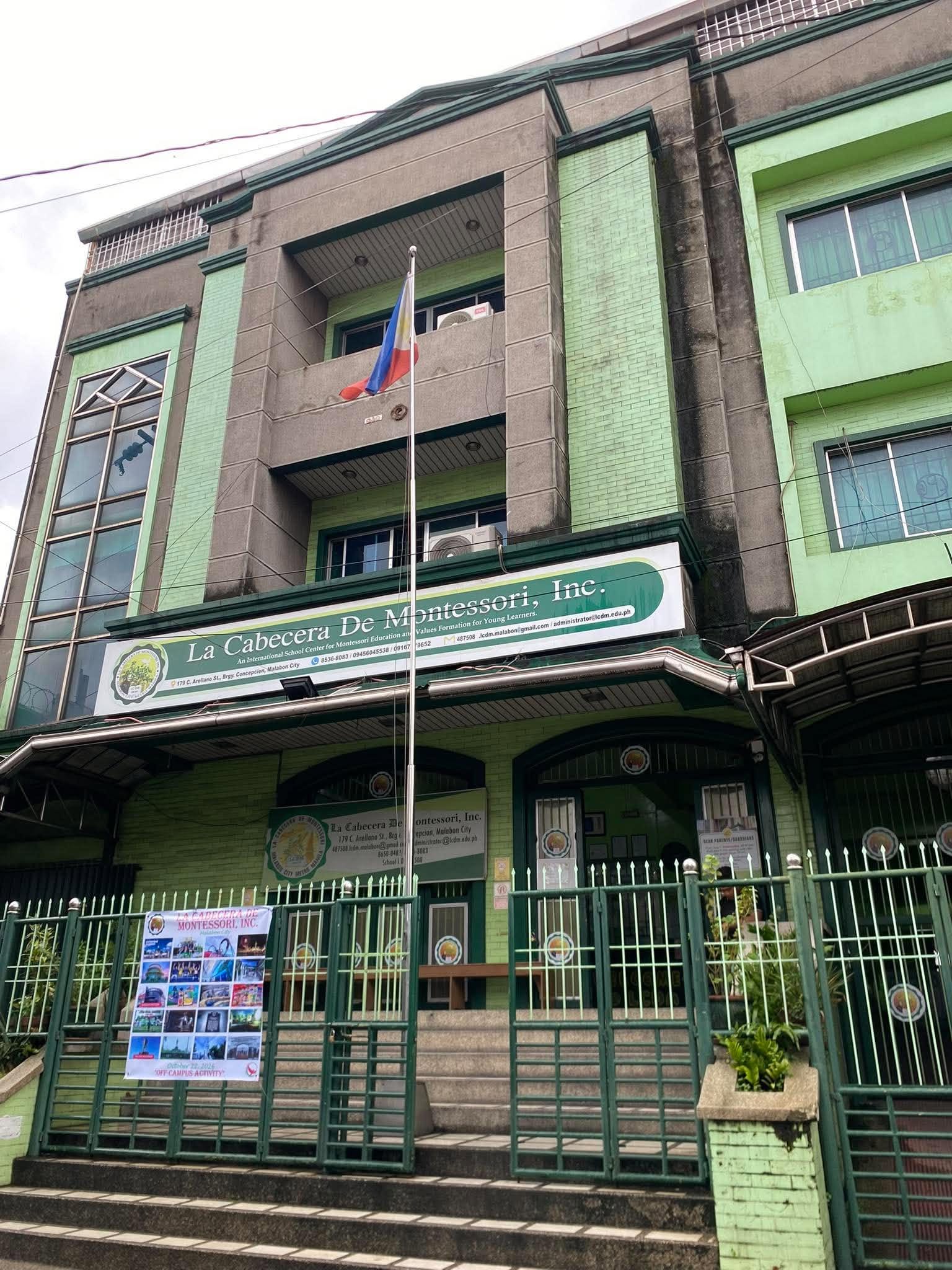 School entrance and gate with the Philippine flag
